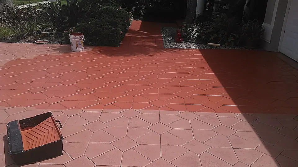 Concrete patio stained a rich terracotta red