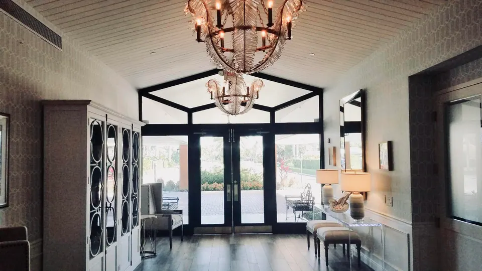 Bright room with arched glass doors after interior painting